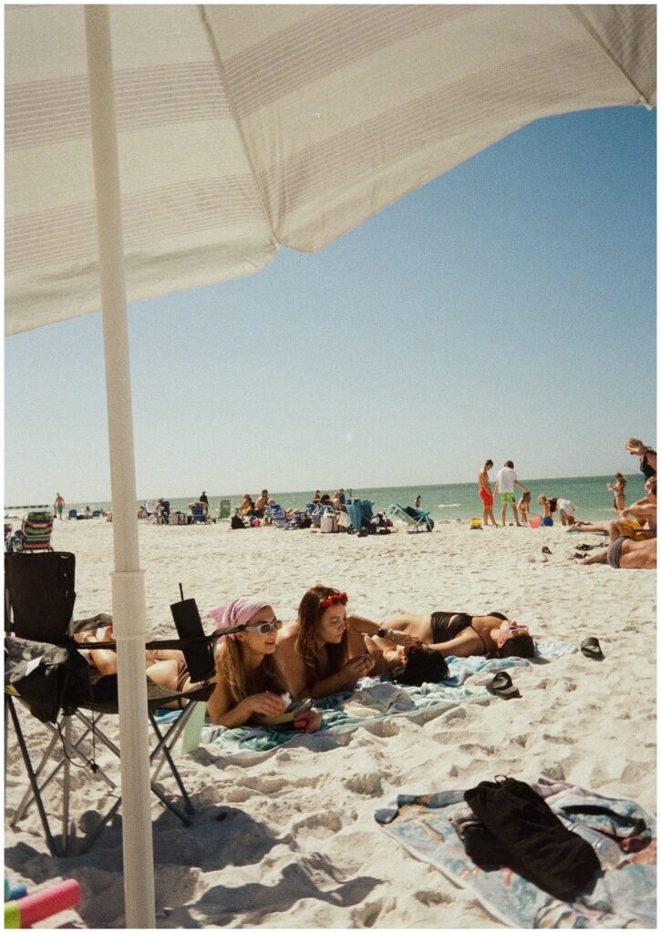 Bridal party enjoying a beach day in St. Pete during the wedding weekend celebration