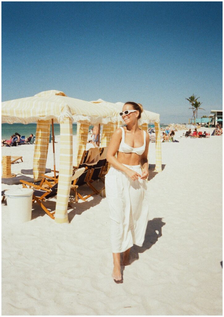 Bridal party enjoying a beach day in St. Pete during the wedding weekend celebration